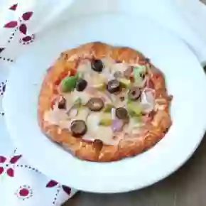 Chewy, low carb pizza crust is easy to make and very filling with just 1.4 net carbs per serving. from lowcarb-ology.com