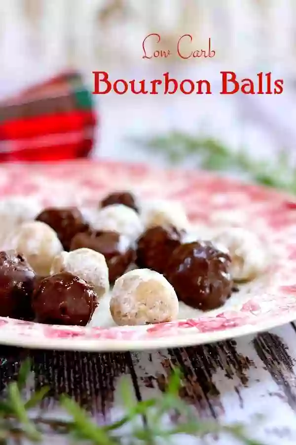 Bourbon balls coated in chocolate on a red and white plate. Title Image