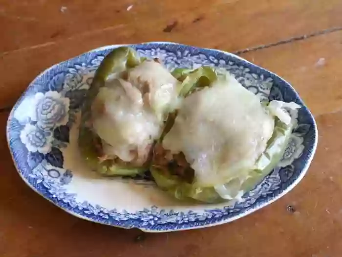 low carb italian beef stuffed peppers without rice are covered in creamy provolone - lowcarb-ology.com
