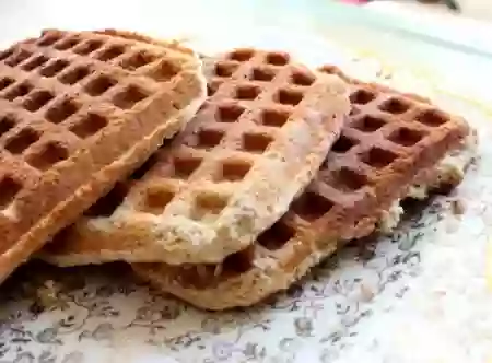 low carb waffles are crispy and perfect with some 0 carb maple syrup! Lowcarb-ology.com