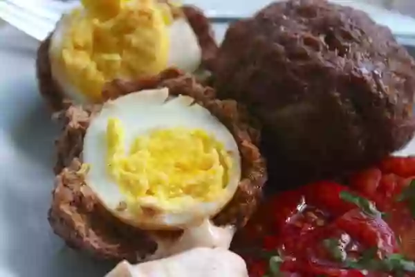 Baked Scotch eggs are easier than you might think and have less than one carb for two of them! Lots of protein, too! Lowcarb-ology.com