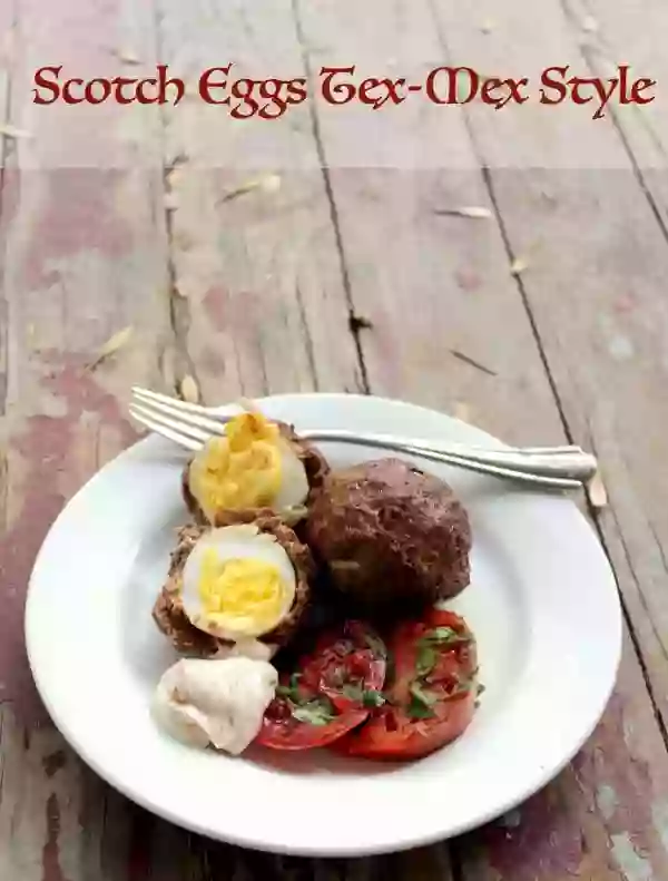 Baked Scotch Eggs are covered in a Tex-Mex seasoned ground beef... so good for breakfast or a light lunch! Less than one carb for two! Lowcrb-ology.com