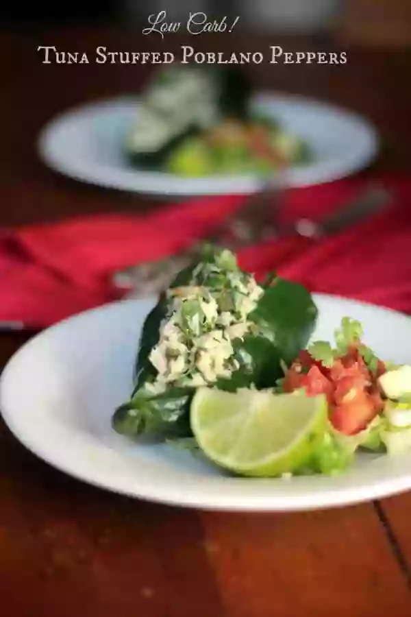 Tuna stuffed poblano peppers are a light low carb lunch with lots of Tex-Mex flavor! From Lowcarb-ology.com