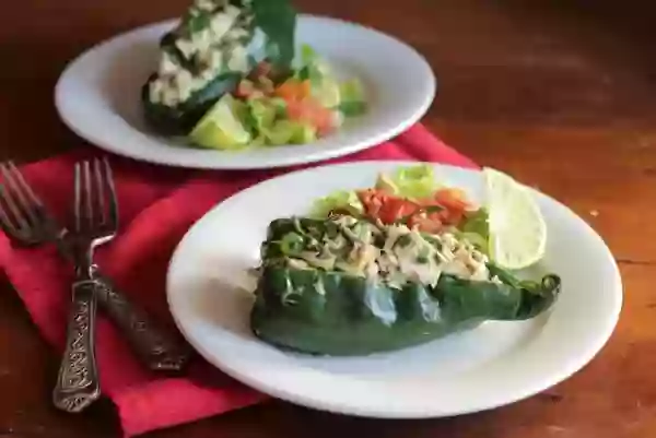 Low carb tuna stuffed poblano peppers go together quick and they are so good! From lowcarb-ology.com