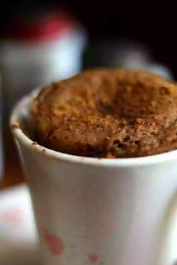 Sprinkle a little cinnamon on top of this low carb spicy gingerbread mug cake. From lowcarb-ology.com