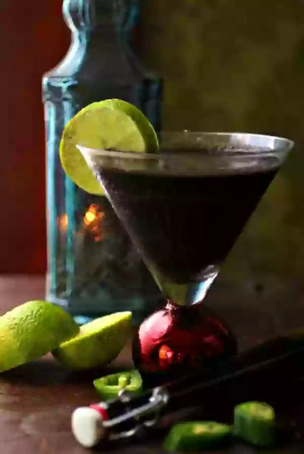 Black colored cocktail that is perfect for parties. From Lowcarb-ology.com