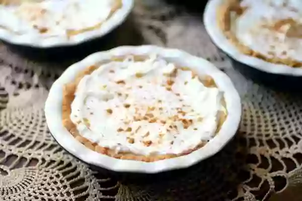 Low carb sour cream lemon pie is an indulgent dessert. From RestlessChipotle.com
