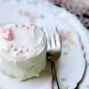 Easy low carb cake recipe has a fluffy texture and creamy white chocolate frosting. From Lowcarb-ology.com