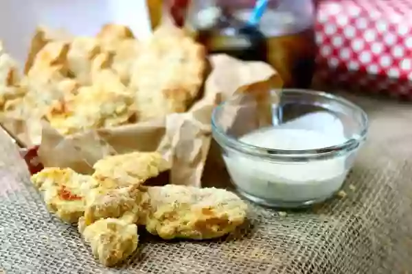 Baked chicken strips, or tenders, have just 3 net carbs per serving! Low carb and gluten free! The chicken is addictively tender and juicy with just a little spicy kick. Click through to find out what gives this chicken it's incredible flavor. From Lowcarb-ology.com