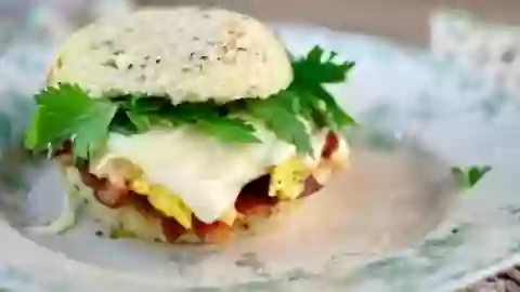 Take a bite of this low carb breakfast sandwich and you won't miss fast food ever again! It's delicious! From Lowcarb-ology.com