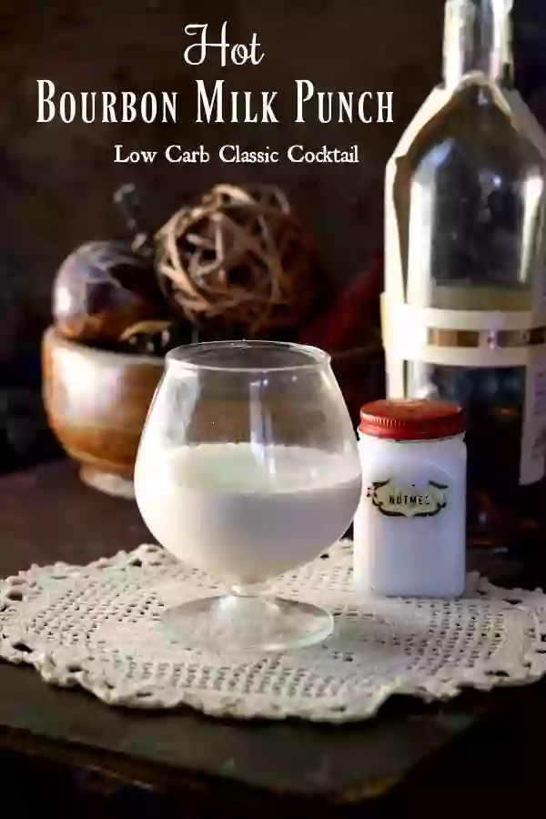 Low carb, hot bourbon milk punch recipe is a warm cup of comfort on a chilly day! This classic Southern cocktail is deceptively sweet and milky. From Lowcarb-ology.com