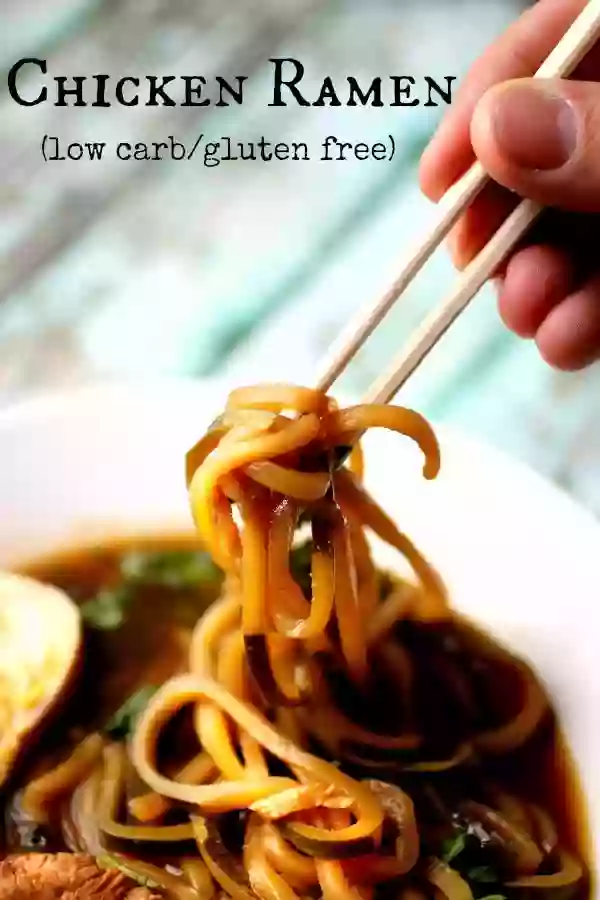 Gluten Free Ramen in a Bowl With Noodles Being Picked up With Chopsticks