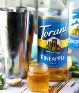 Add the Torani Sugar Free Syrups to the shaker with the rum