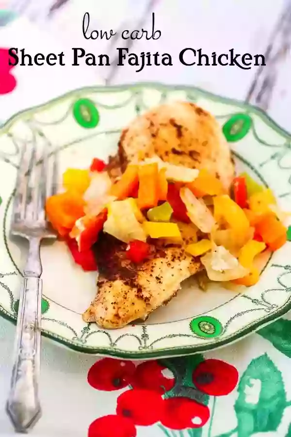 Low carb chicken fajitas covered with colorful bell peppers on a green and white plate. Title image
