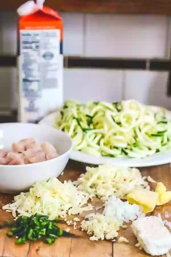 The ingredients for low carb chicken tetrazzini are laid out on the counter.