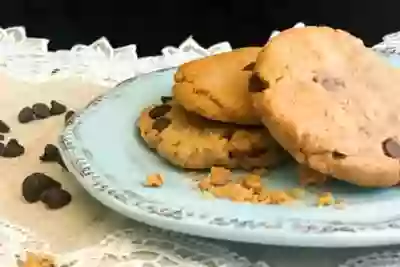 Closeup of a stack of peanut butter chocolate cookies on a plate