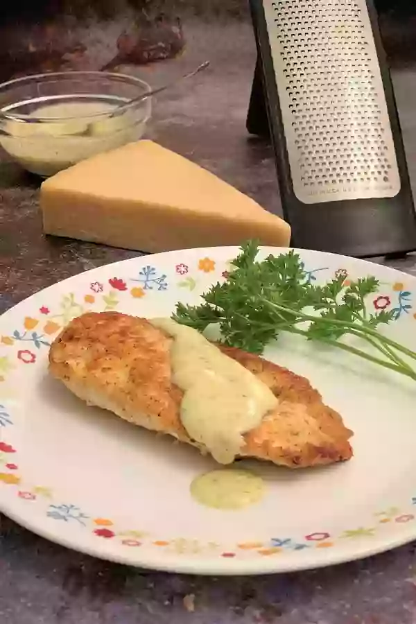 Easy Parm Chicken Using Real Parmesan Cheese and No Breadcrumbs.