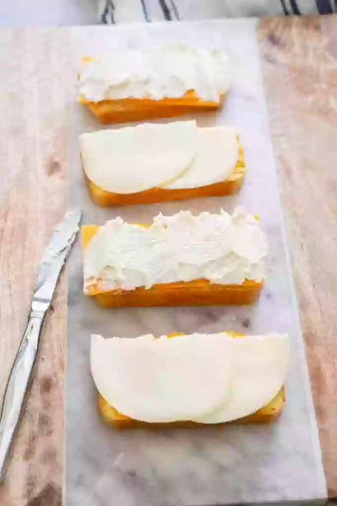 Adding Cheese Slices on Bread