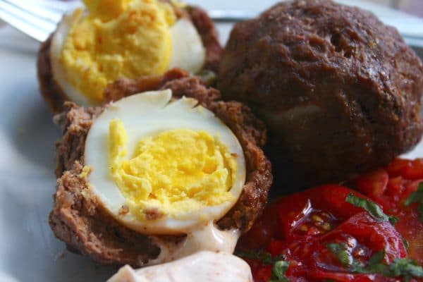 Baked Scotch eggs are easier than you might think and have less than one carb for two of them! Lots of protein, too! Lowcarb-ology.com