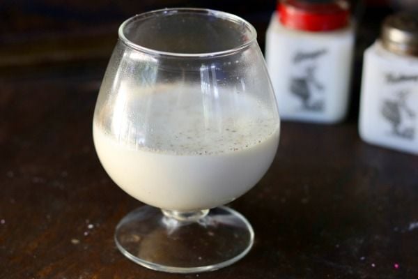 Low carb, hot bourbon milk punch recipe is a warm cup of comfort on a chilly day! This classic Southern cocktail is deceptively sweet and milky. Perfect for autumn sipping! from Lowcarb-ology.com