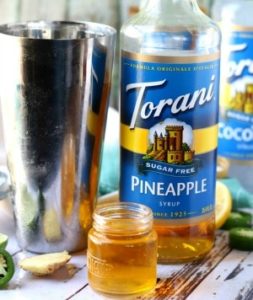 Add the Torani Sugar Free Syrups to the shaker with the rum